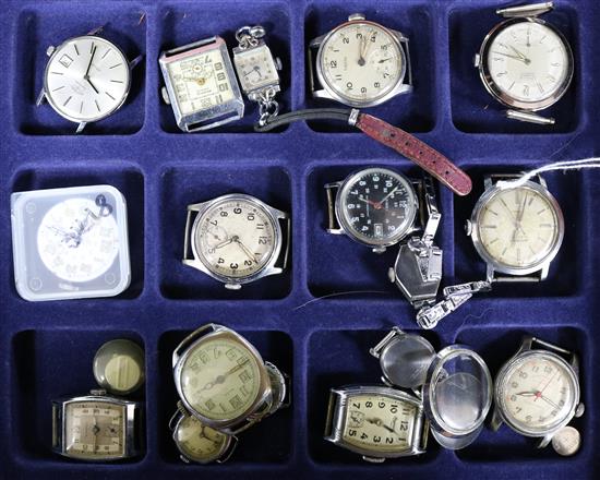 A collection of wristwatches, various, many lacking their straps,